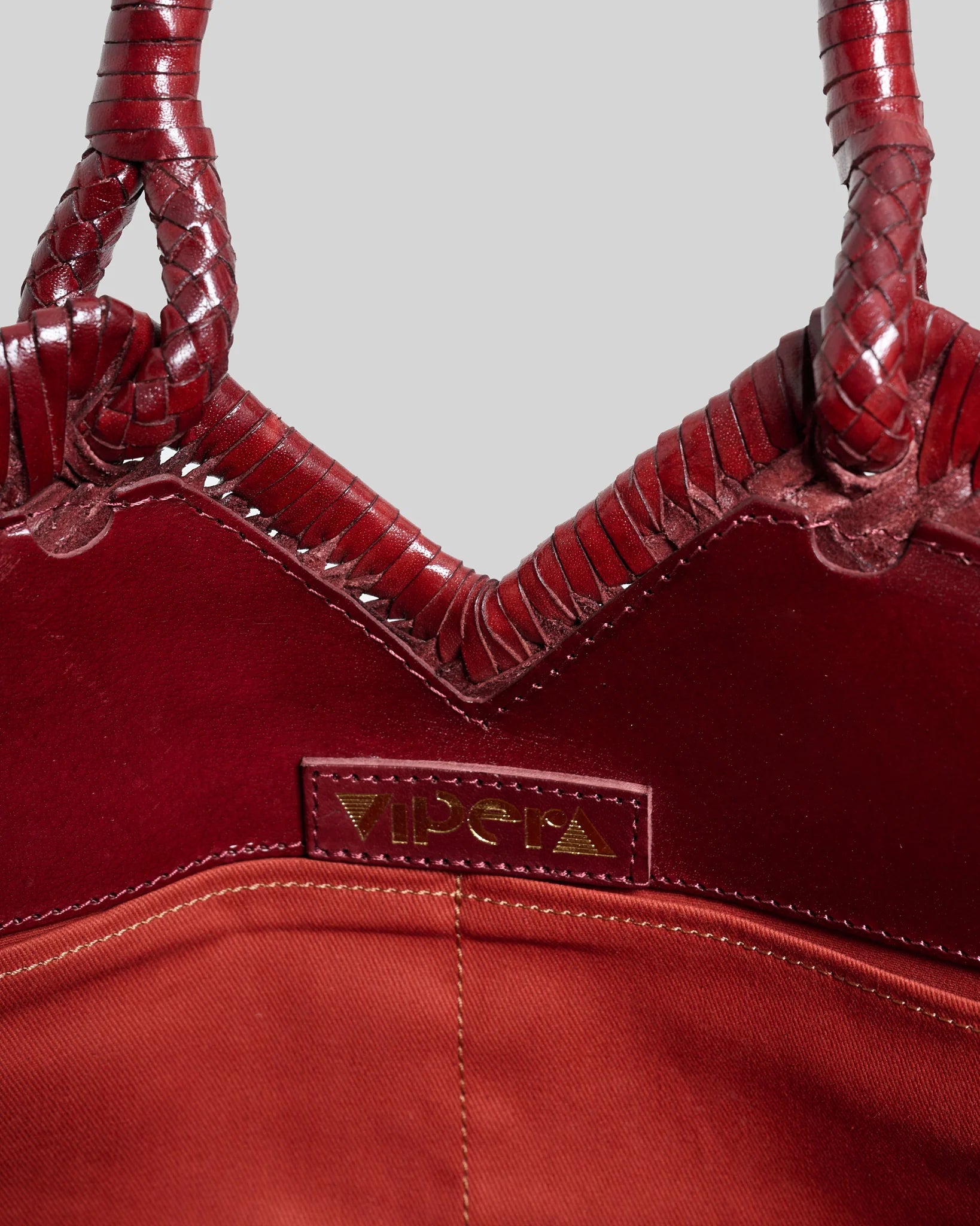 Borsa in pelle intrecciata Vipera