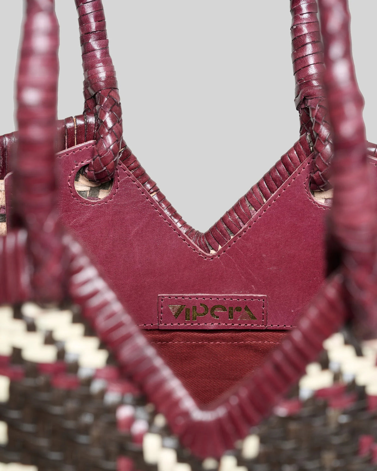 Borsa in pelle intrecciata Vipera