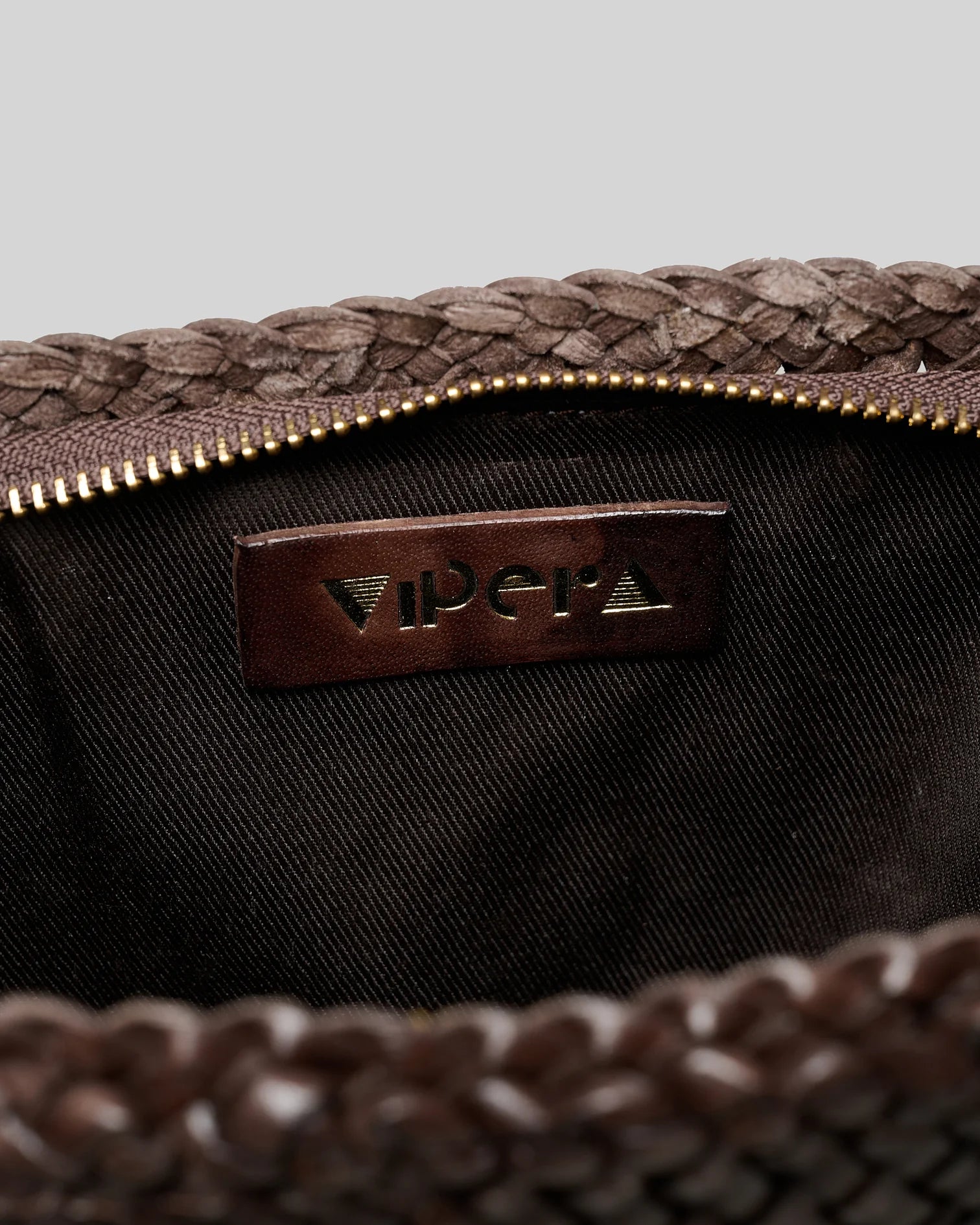 Borsa in pelle intrecciata Vipera