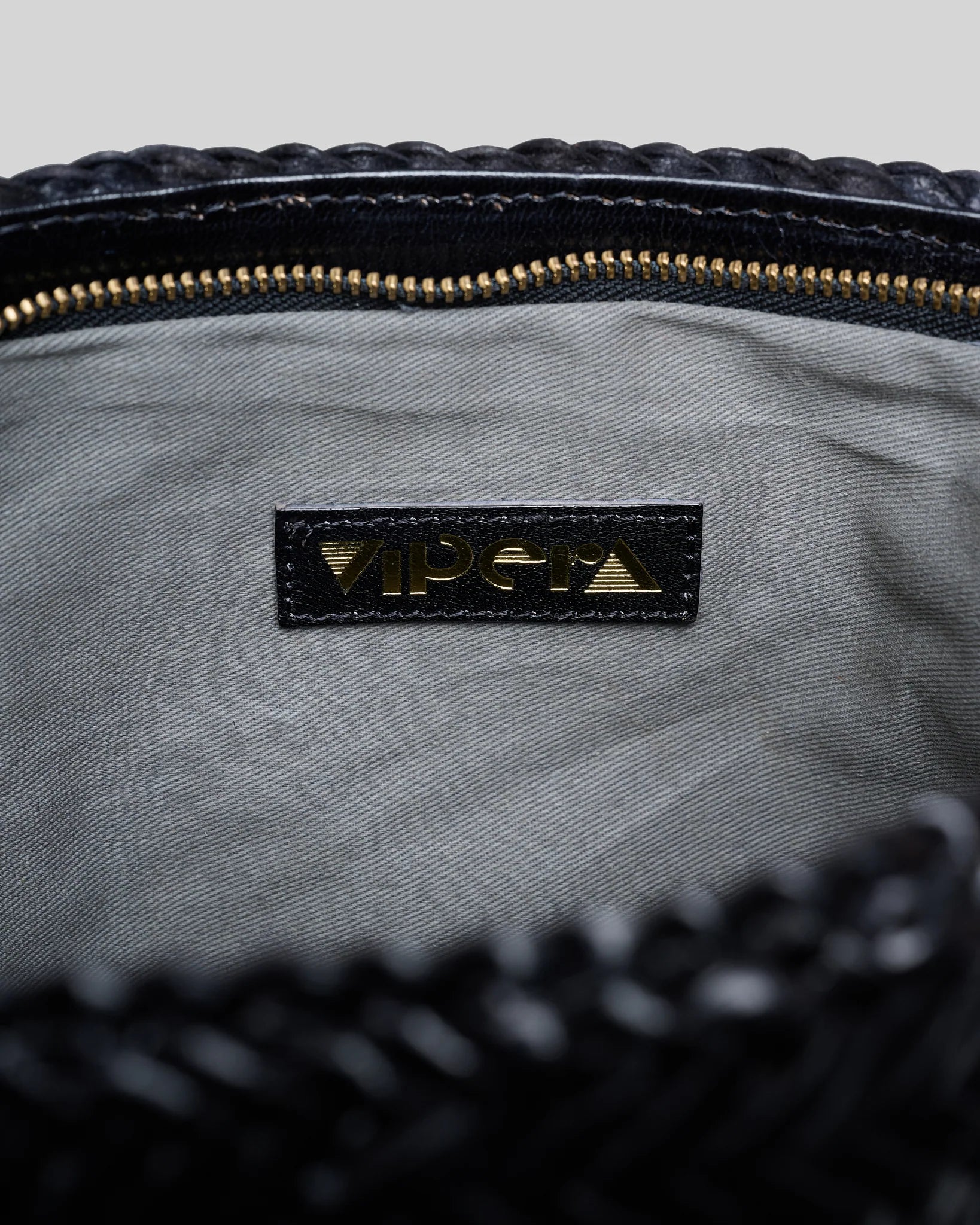 Borsa in pelle intrecciata Vipera